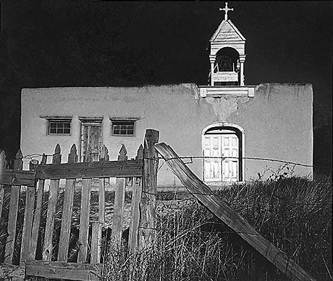 Small Church - Taos County, New Mexico - photograph by Irving Rusinow.