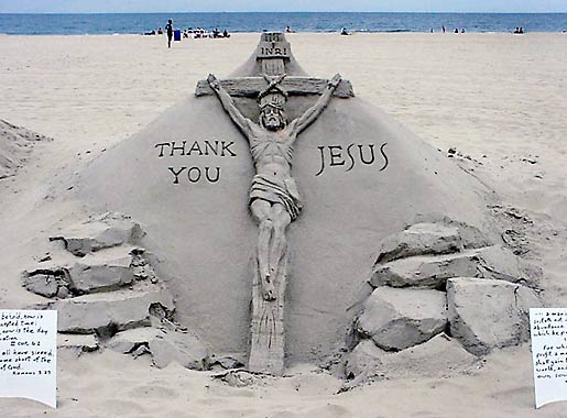Crucifix Sand Sculpture by Randy Hofman.